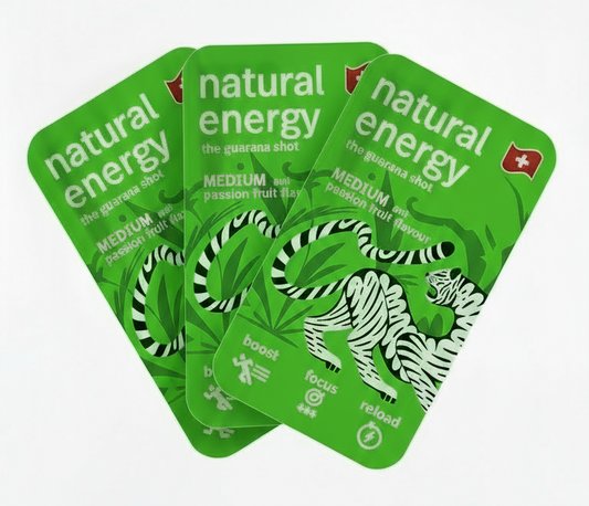 three passionfruit 'natural energy' packets with a tiger design on a clear background